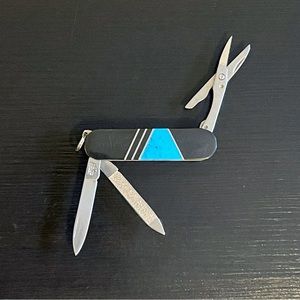Vintage Camillus pocket multi tool in turquoise and jet